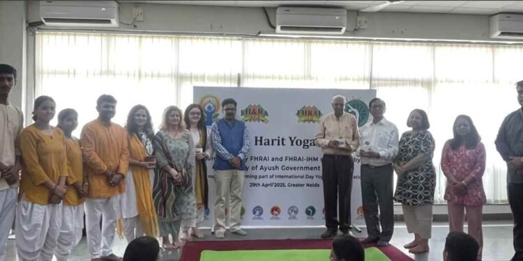FHRAI Hosts ‘Harit Yoga’ at FHRAI-IHM to Mark International Day of Yoga 1 FHRAI Harit Yoga, International Day of Yoga 2025, FHRAI-IHM Yoga Event, Hospitality Industry Yoga, Wellness and Nature Event, Ministry of Ayush Yoga, Mokshayatan Yog Sansthan, Yoga for Peace and Wellness, Environmental Consciousness Yoga, Green Practices Yoga, Sustainable Living Yoga, Yoga and Tree Planting, Greater Noida Yoga Event, Yoga for Hospitality Professionals, Harit Yoga Theme, Yoga and Mindfulness, Yoga Breathing Exercises, Guided Meditation Event, Yoga and Ecological Health, Jaison Chacko FHRAI,