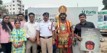 Fortis helmet safety drive, road safety campaign India, Fortis Healthcare initiative, traffic police partnership, helmet distribution India, Fortis Hai Na campaign,Fortis Hospital