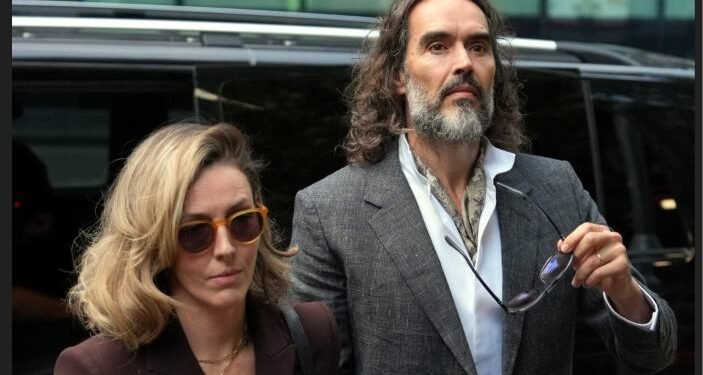 Russell Brand arrives at Southwark Crown Court in London as his trial on seven criminal charges begins.